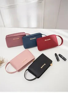 Detailed view of the mini lychee leather wristlets in five diverse colors