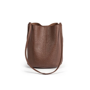 Retro dark brown pleated bucket bag with long strap and large capacity in high quality leather