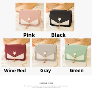 Various colors of small square crossbody bags with cat ear gold hardware and pearl tassels