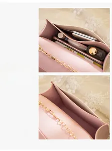 Pink chain crossbody bag interior view showing space for phone and makeup storage