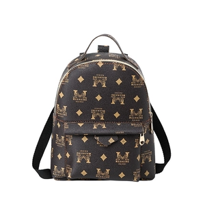 Mini sac à dos vintage marron de style britannique avec imprimé monogramme et zip doré