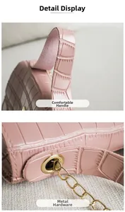Détails du sac à main rose gaufré crocodile avec large poignée et œillets dorés