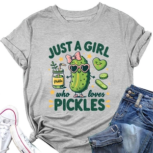 Detail of grey crewneck T-shirt featuring cartoon pickle graphics and casual styling
