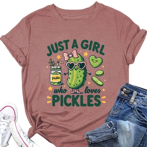 Flat lay of pink cotton T-shirt featuring 'Just a girl who loves pickles' cute print