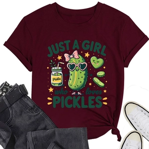 Detail of burgundy cotton t-shirt with cute cartoon pickle print and knotted hem