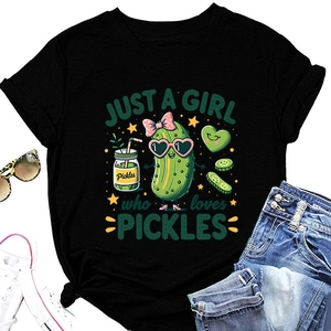 Detail of a black cotton T-shirt featuring cartoon pickles print and casual flat lay styling