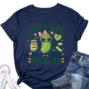 Flat lay of navy blue T-shirt featuring cartoon pickles and stylish knot detail