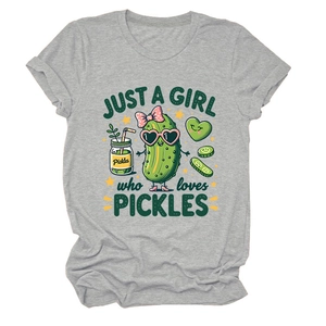 Close-up of grey t-shirt featuring a cartoon pickle design and Just a Girl Who Loves Pickles text