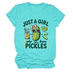 Close-up of mint green t-shirt with Just a Girl who loves Pickles cartoon graphic