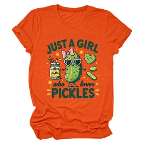 Detail of vibrant orange cotton T-shirt featuring a cute cartoon pickle graphic and text