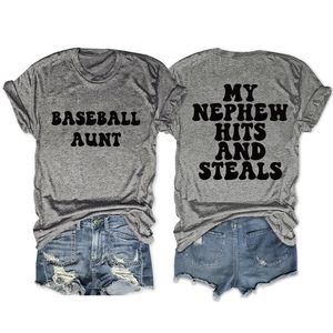 Detail view of grey Baseball Aunt t-shirt and frayed denim shorts showing front and back print