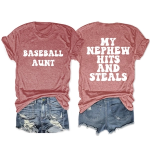 Detail of red heather baseball aunt t-shirt with bold lettering and denim shorts
