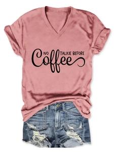Detail of V-neck dusty pink cotton t-shirt with black NO TALKIE BEFORE coffee print