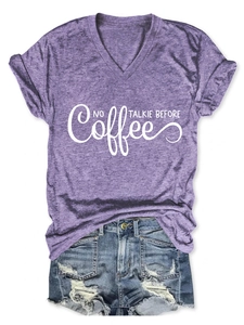 Close-up of V-neck heather purple T-shirt with 'No Talkie Before Coffee' print text
