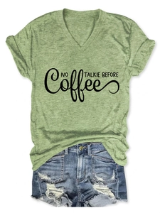 Detail of V-neck t-shirt with black art font text print and soft textured fabric