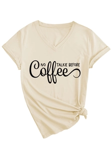 Detail of beige V-neck T-shirt with No Talkie Before Coffee slogan and tied hem knot