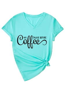 Detail of V-neck mint green t-shirt with NO TALKIE BEFORE Coffee print and side knot