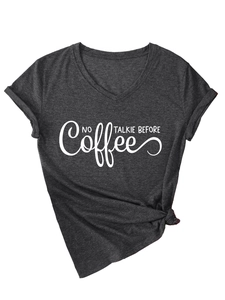Detail of V-neck dark grey t-shirt with NO TALKIE BEFORE print and knotted hem