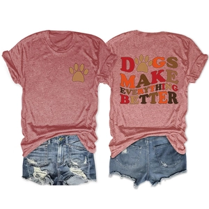 Detail showing Dogs Make Everything Better graphic on back of rust red cotton t-shirt