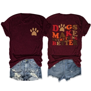 Detail of burgundy T-shirt featuring 'Dogs Make Everything Better' print and paw logo