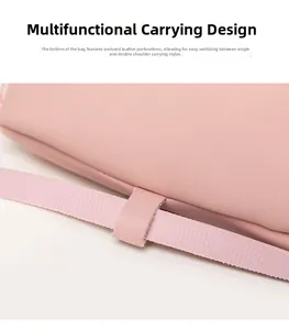 Close-up of the adjustable strap attachment and buckle on this pink faux leather backpack