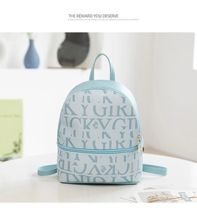 Close-up of light blue mini backpack featuring Lucky Girl print and lychee texture