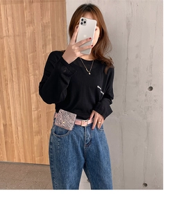 Zebra print mini waist bag with pink leather belt and gold buckle on blue jeans