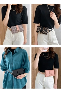 Detail of assorted animal print and solid color waist bags with gold metal rings