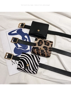 Flat lay of mini leopard, zebra, and black PU leather waist bags with gold buckles