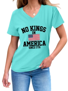 Close-up of the V-neck and No Kings in America print on this light blue casual t-shirt