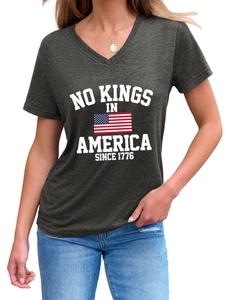 Detail of grey V-neck T-shirt with No Kings In America 1776 print and American flag