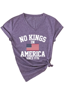 Detail of V-neck heather purple t-shirt featuring rolled sleeves and a stylish front hem knot