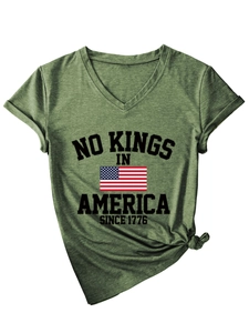 Detail of army green V-neck T-shirt with No Kings In America 1776 print and stylish hem knot