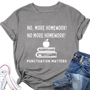 Macro shot of grey cotton T-shirt featuring NO MORE HOMEWORK graphic print detail