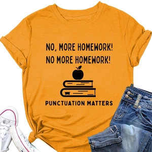 Flat lay of ginger crew neck t-shirt with educational print, books and sneakers