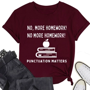 Flat lay of wine red graphic t-shirt with educational quote paired with black jeans