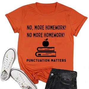 Detail of orange cotton T-shirt with No More Homework text and apple graphic on books