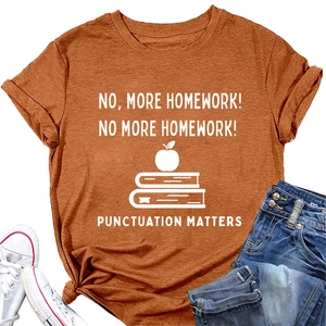 Detailed flat lay of a caramel orange cotton T-shirt featuring a white punctuation slogan