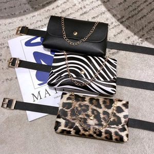 Three-pack stylish animal print fanny packs with gold chains and adjustable belts