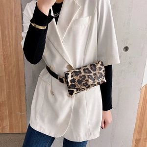 Chic leopard print waist bag with gold chain on white blazer for women