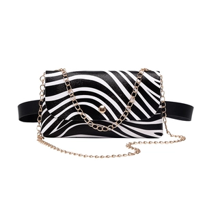 Zebra print crossbody fanny pack with gold chain strap and black adjustable waist belt