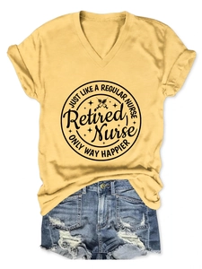 Detail of yellow V-neck tee with black Retired Nurse graphic and syringe print design