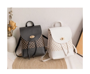 Detail of grid patterned PU leather backpacks with metal turn-lock and tassel drawstring