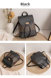 Detail of black leather flap and brown printed backpack with golden rotary lock buckle