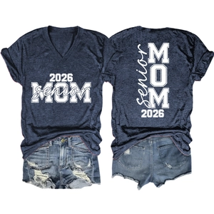 Detail of Senior MOM 2026 lettering on navy V-neck t-shirt and distressed denim shorts
