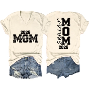 Detail of V-neck beige T-shirt with black 2026 MOM Senior print and ripped denim shorts