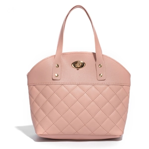 Chic pink quilted tote bag with golden twist lock and rivet handles for women