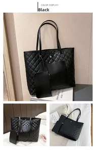 Close-up of black quilted tote bag set with matching small zipper pouch in PU leather
