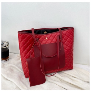 Detailed set of red quilted tote bag with a matching detachable zipper pouch insert