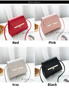 Detailed view of structured mini square bags in red, pink, grey and black with gold locks
